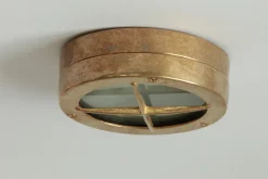 Kleine vergitterte Bullaugen-Wandleuchte aus Messing